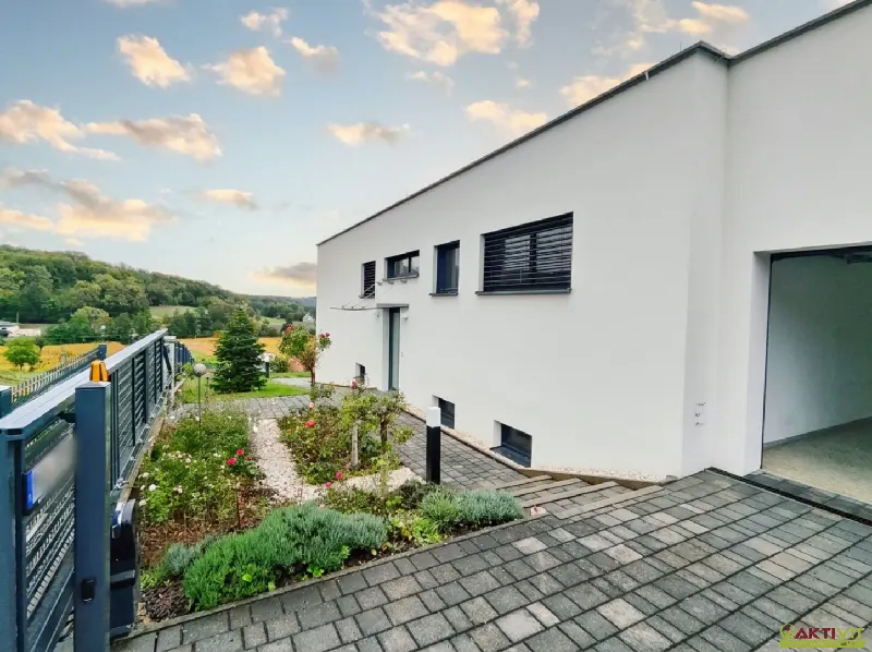 Individuelle Architektenvilla mit Traumküche und großem Grundstück in Aussichtslage im Südburgenland.
